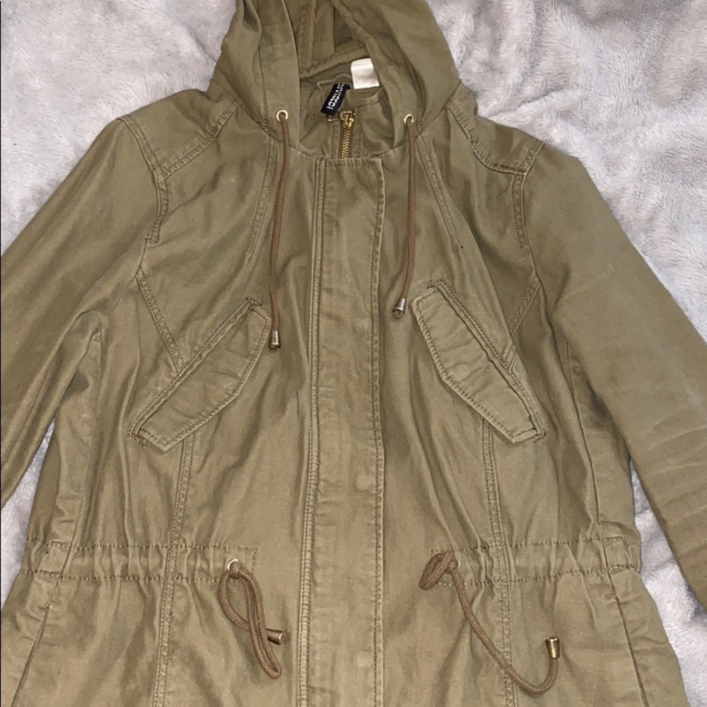 Green utility jacket.